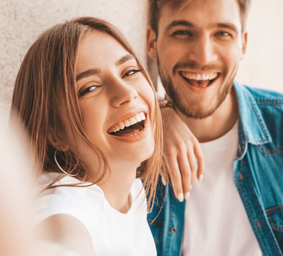 two people smiling